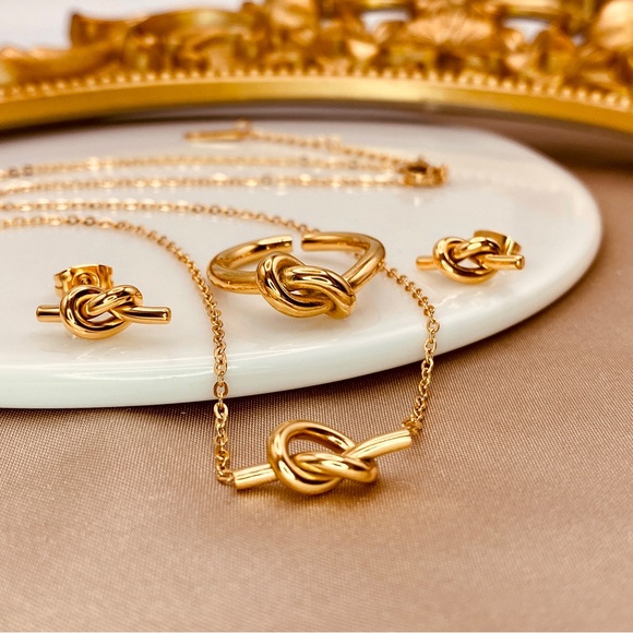 Minimalist Knot Open ring design in 18K Gold- Titanium Steel. - Picture 4 of 5